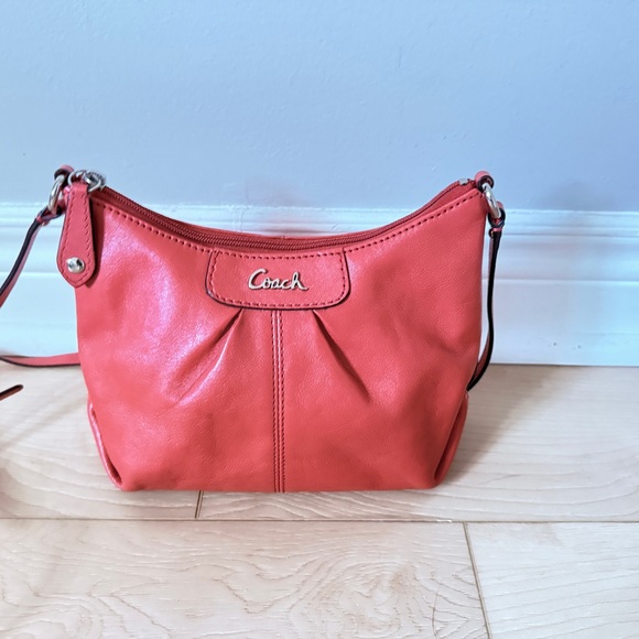 Coach Handbags - Coach Vibrant Coral Leather Crossbody Bag